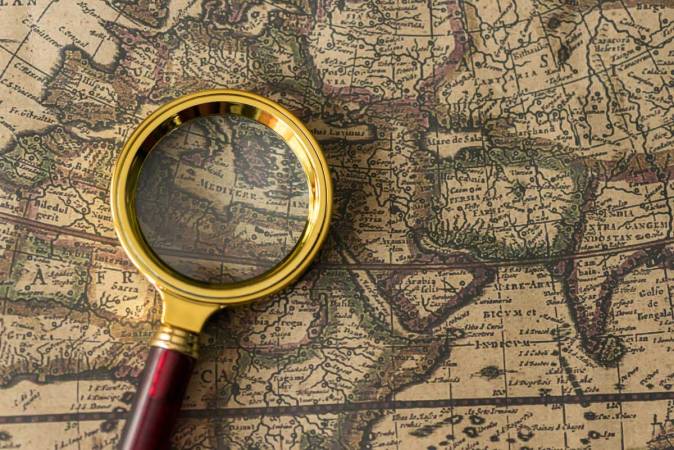 retro-magnifier-with-old-map-2026-01-09-08-04-47-utc
