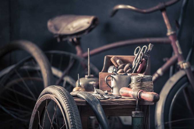 old-bicycle-repair-workshop-with-wheels-tools-an-2026-01-09-07-00-23-utc