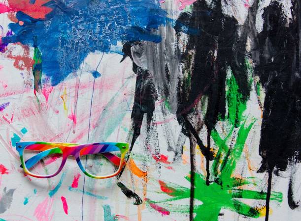 glasses-on-a-art-paint-as-background-above-view-2026-03-09-07-13-12-utc