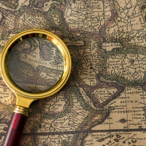 retro-magnifier-with-old-map-2026-01-09-08-04-47-utc