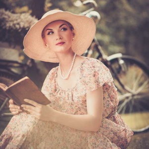 blond-beautiful-retro-woman-reading-book-on-a-mead-2026-03-25-23-52-18-utc