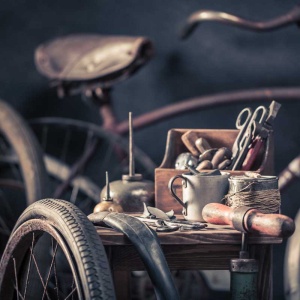 old-bicycle-repair-workshop-with-wheels-tools-an-2026-01-09-07-00-23-utc