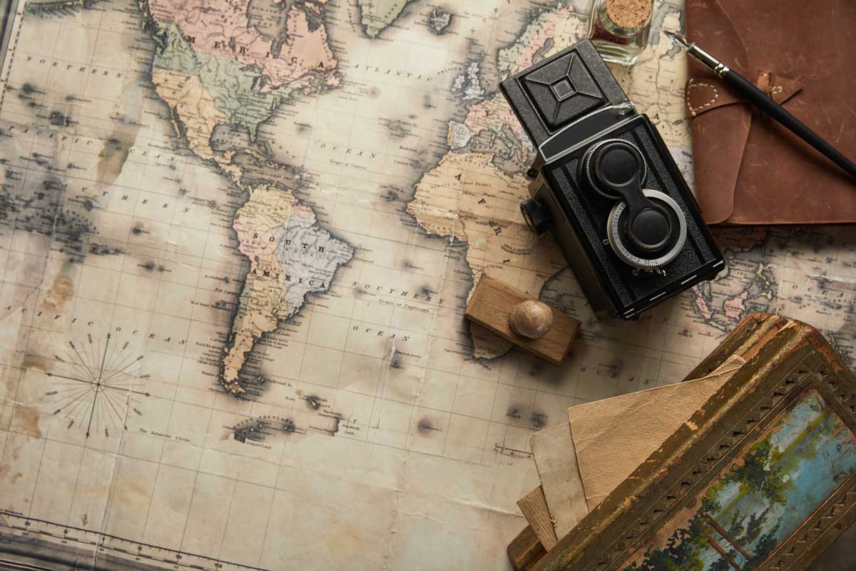 top-view-of-vintage-camera-notepad-with-fountain-2026-01-06-00-29-01-utc