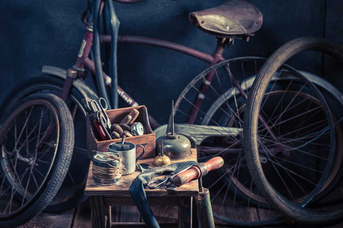 small-bicycle-repair-workshop-with-tools-and-wheel-2026-03-24-14-30-31-utc