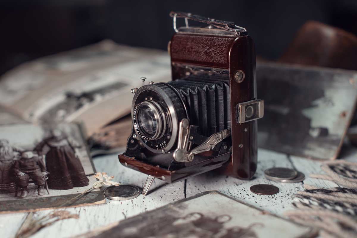 vintage-film-camera-among-old-family-photos-2026-01-07-05-49-48-utc