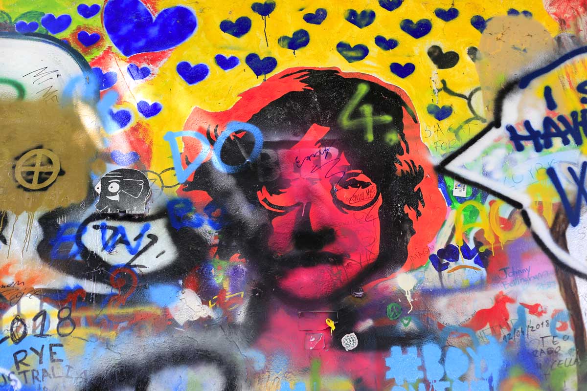detail-of-john-lennon-s-wall-with-graffiti-in-prag-2026-03-17-23-43-37-utc
